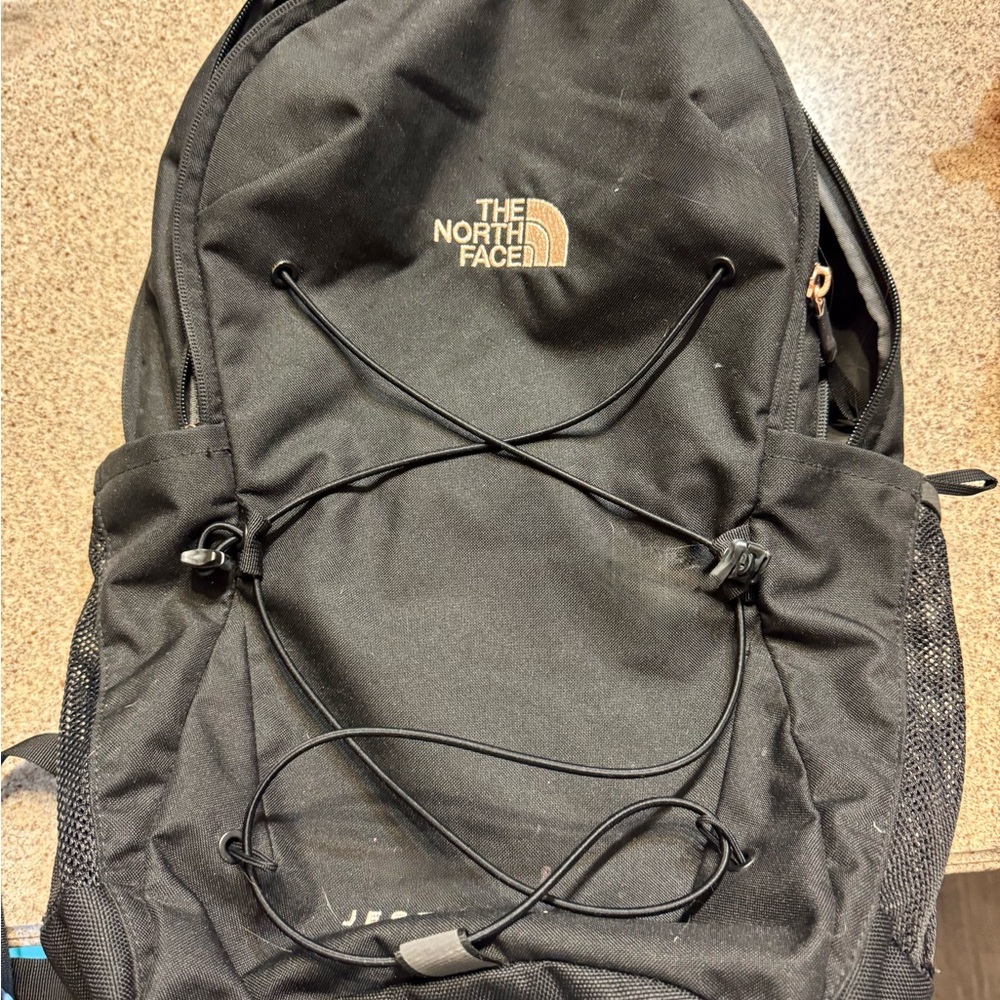 The North Face Black Backpack with Sporty Design and Durable Fabric